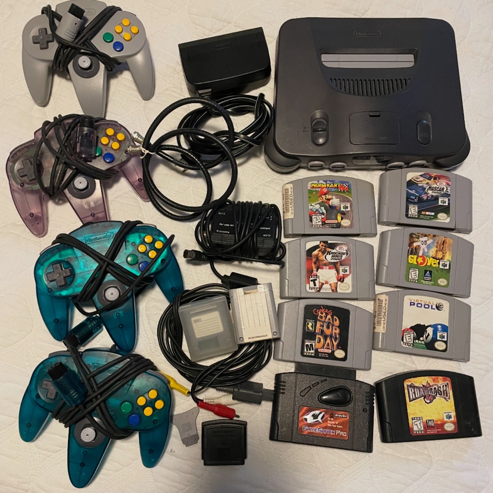 Nintendo Console with Black and Multicolor Controllers